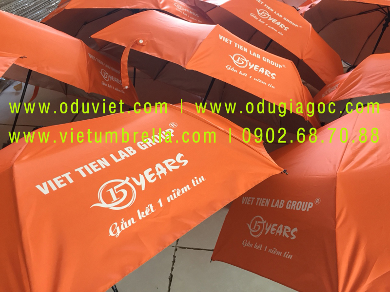 xưởng sản xuất ô dù cầm tay in logo quảng cáo